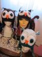 A parliament of hand crocheted owl hats by Crazy Rebecca